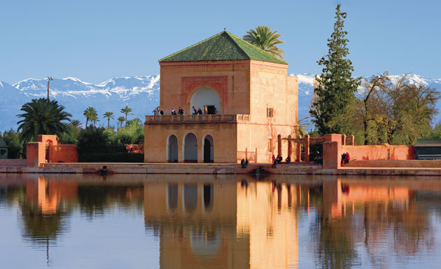Panoramic view of the Menara Gardens with the pavilion and reflecting pool in Marrakech