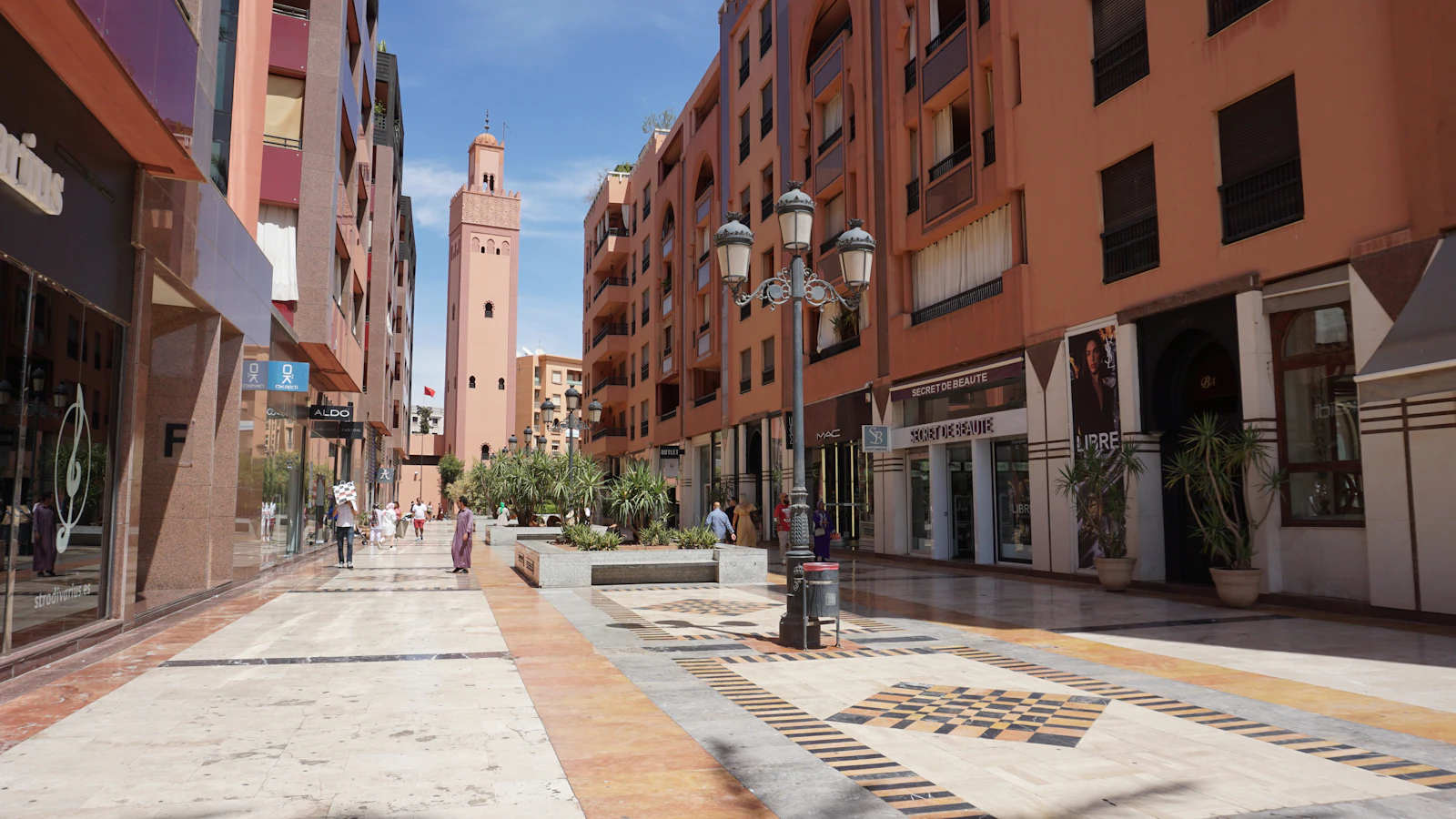 Marrakech shopping mall with international stores and shoppers